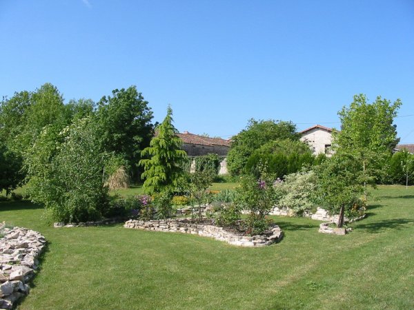 Formal shared garden at Les Hiboux gites, France