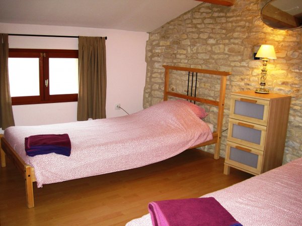 Twin bedroom in La Grange holiday home, France