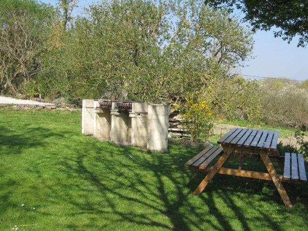 Shared bbq area at Les Hiboux holiday gites, France